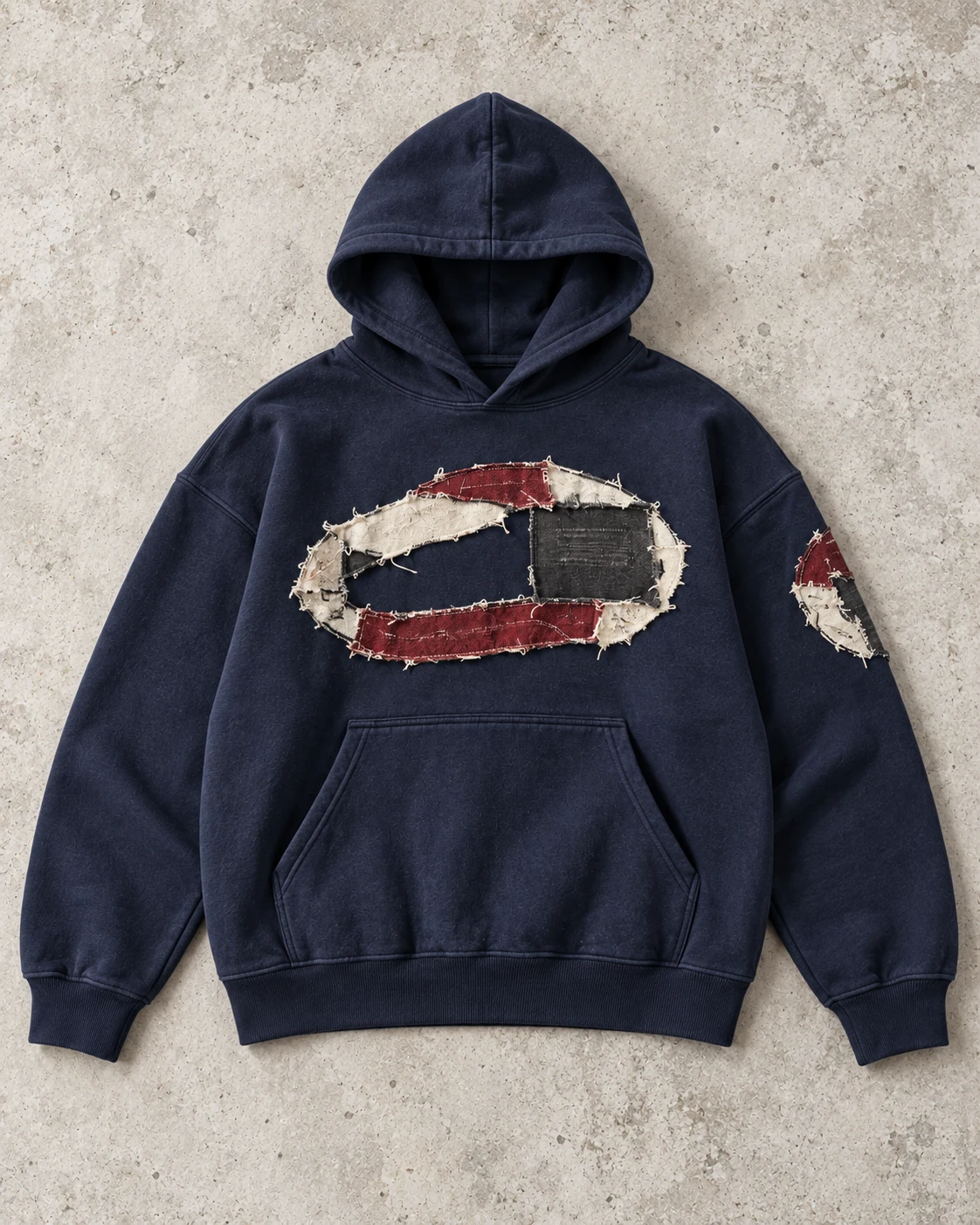 Full garment flat-lay showing the cut — Appliqué & Embroidered Hoodie in navy / bone / oxblood, AI-generated design concept
