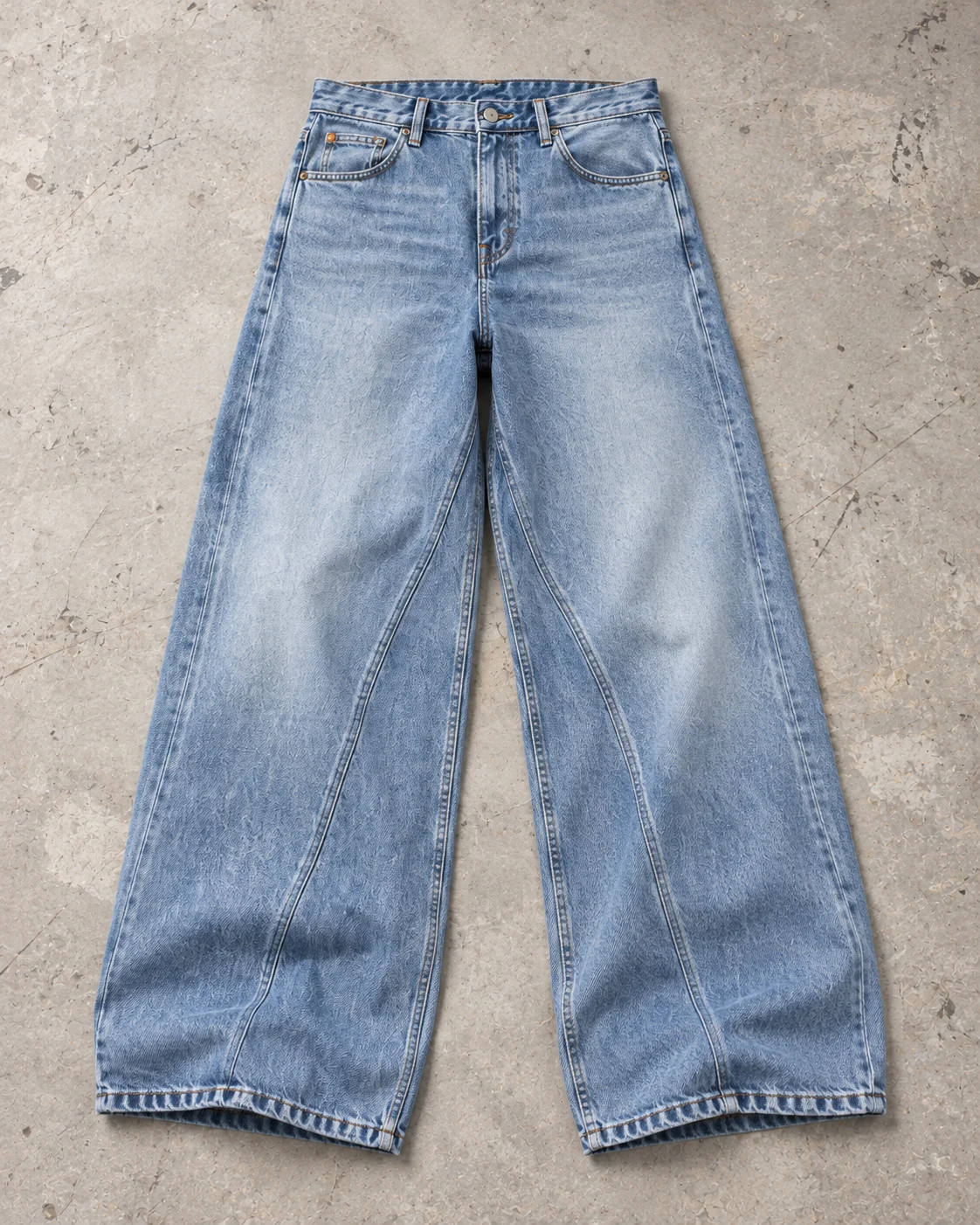 Full garment flat-lay showing the cut — Baggy Wide-Leg Jeans in ice blue / faded indigo, AI-generated design concept