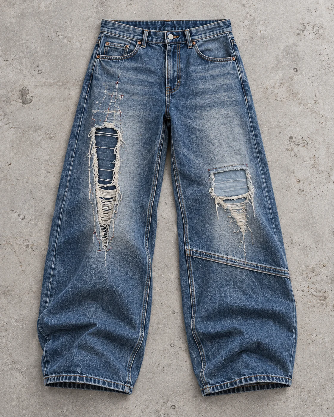 Full garment flat-lay showing the cut — Distressed & Repaired Baggy Jeans in faded indigo / deep blue, AI-generated design concept