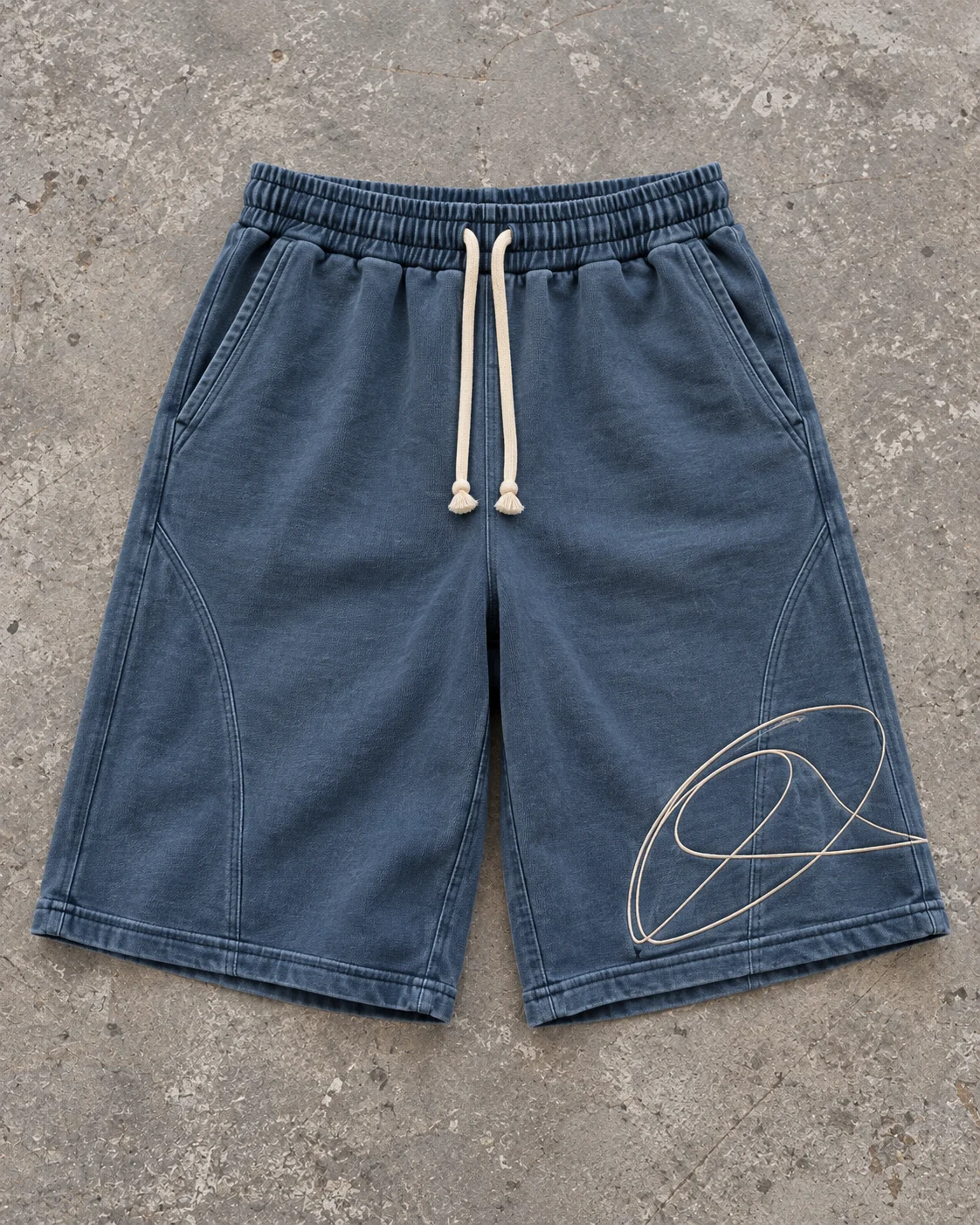 Full garment flat-lay showing the cut — Heavyweight Sweat Shorts in faded petrol / cream, AI-generated design concept