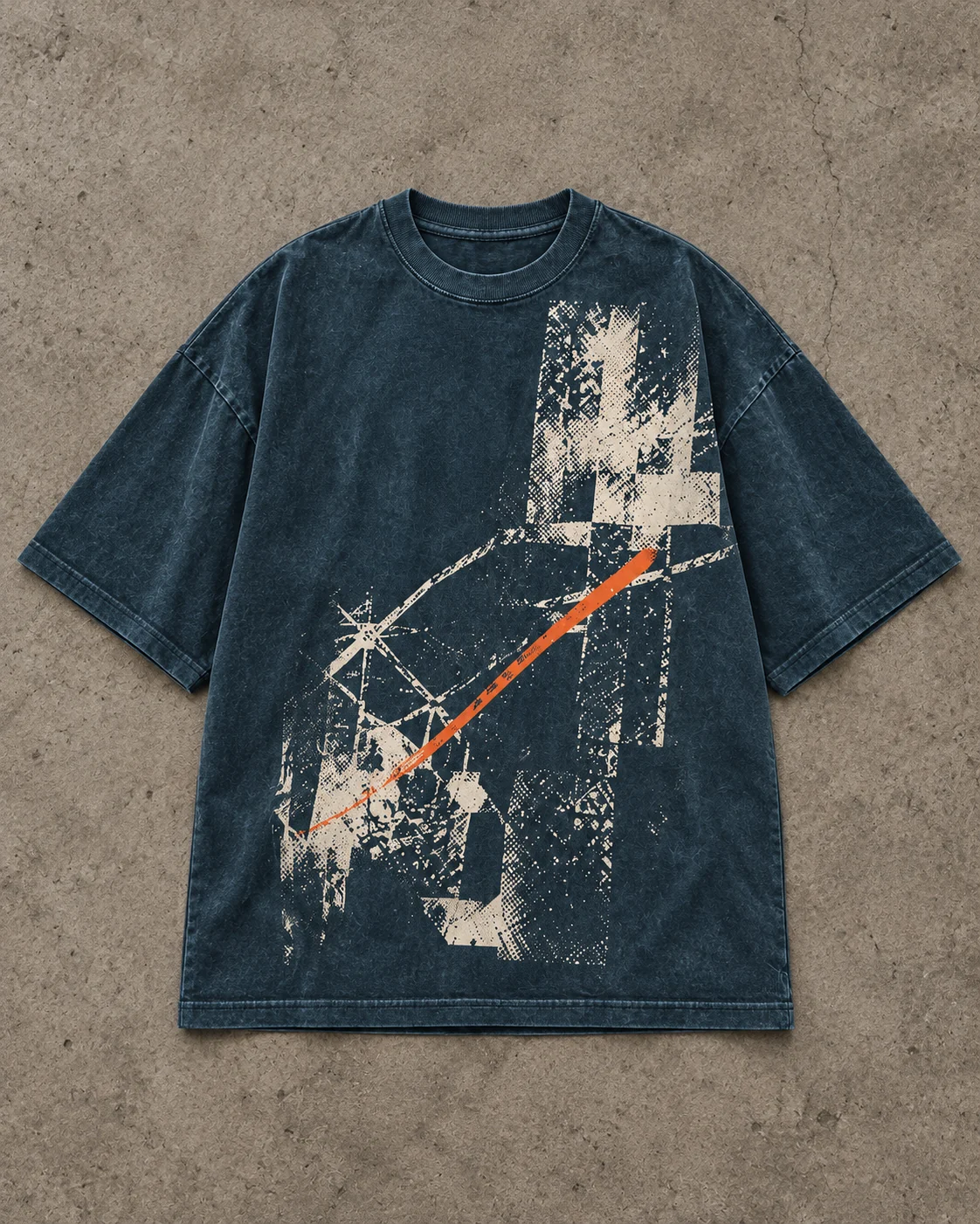 Flat-lay of petrol-blue oversized graphic T-shirt showing a longer loose body, dropped shoulders, broad sleeves and large front print