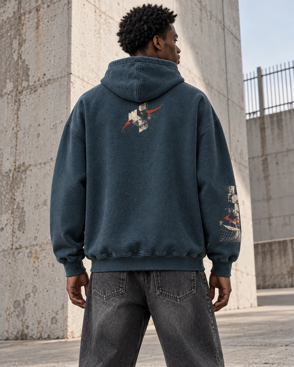 Distinct back design on the same model — Oversized Graphic Hoodie in petrol / bone / vermilion, AI-generated design concept