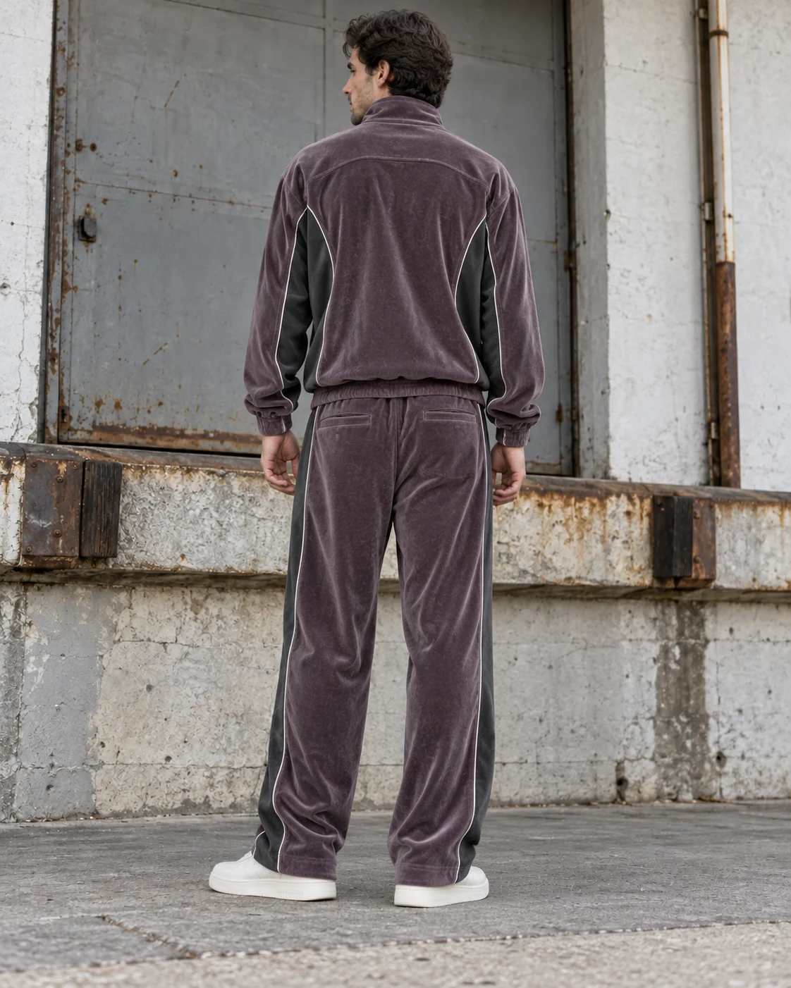 Back view of the same coordinated set — Velour Zip Tracksuit in smoked plum / graphite, AI-generated design concept