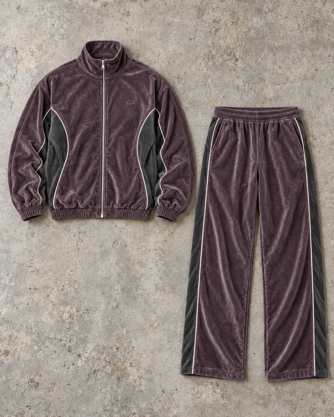 Complete top and bottom flat-lay showing their proportions — Velour Zip Tracksuit in smoked plum / graphite, AI-generated design concept