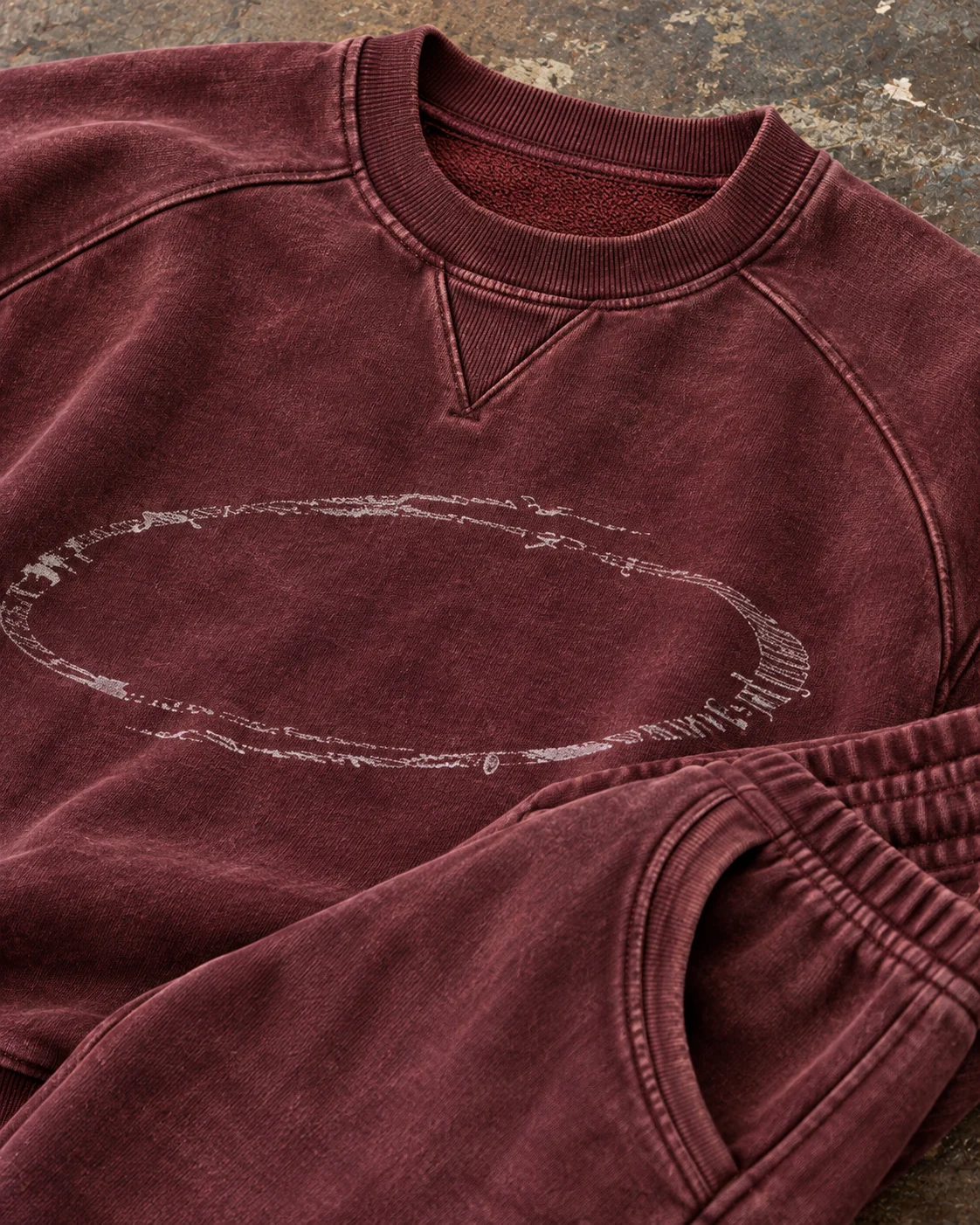 Close-up of fabric and coordinated construction — Vintage-Wash Sweat Set in faded oxblood / chalk, AI-generated design concept