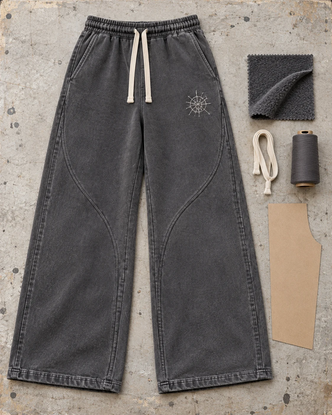 Garment development concept with materials and trims — Wide-Leg Sweatpants in washed graphite / bone, AI-generated design concept